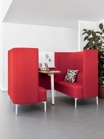 A red naughtone Pullman Booth.