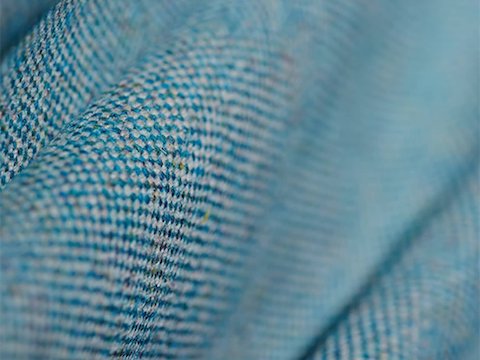 A Main Line Flax fabric swatch in blue.