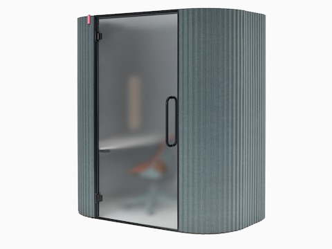 An angle view of a Bay Work Pod Pro with a Zeph Chair inside.