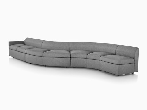 Curved grey Bevel Sofa Group, viewed from the front at an angle.