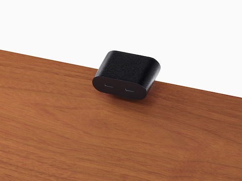 Ello Mini surface clamp USB-C power solution shown in black.