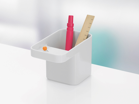 A white Formwork Pencil Cup containing a marker and ruler.