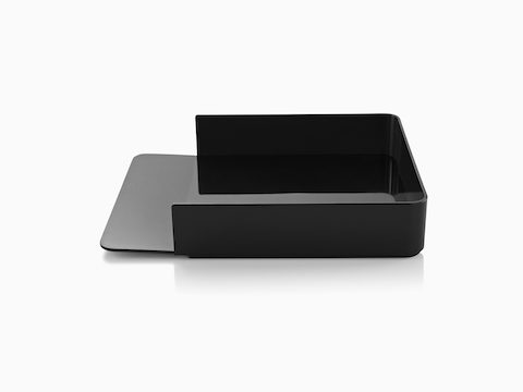 Profile view of a black Formwork Paper Tray with a gently sloped lip.