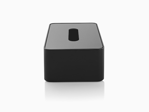 A black Formwork Tissue Box, viewed from the narrow side.