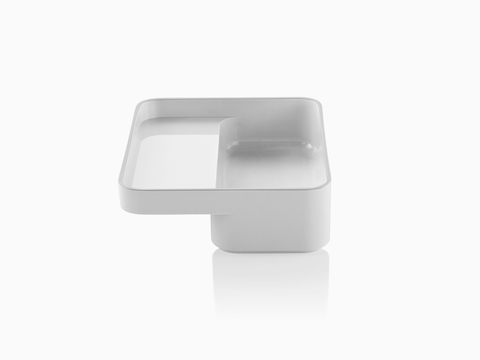 Profile view of the small version of a white Formwork Tray with a deep rear compartment and cantilevered front compartment.