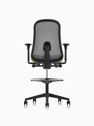 Black and green Lino Stool with adjustable sacral lumbar support, viewed from the back.