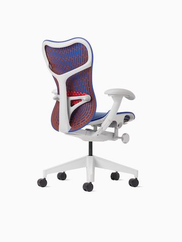 Rear angle view of a Mirra 2 Chair with a Butterfly back in ultramarine colour-block and alpine frame.