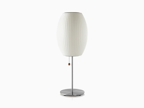A white Nelson Cigar Lotus Table Lamp with a steel base.