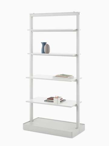 A gray OE1 Agile Wall with full shelves and styling elements, viewed from an angle.