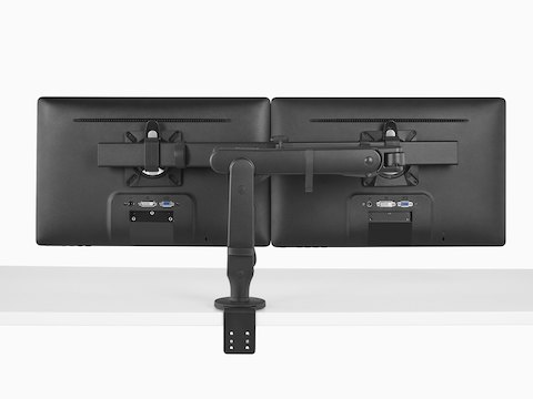 The back view of two monitors suspended from a black Ollin Monitor Arm, showing how the monitors are attached.