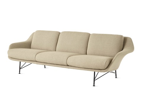 A Striad Low-Back Sofa with Three Seats in tan.