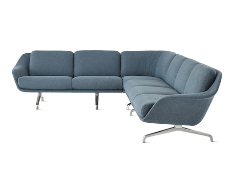A Striad Modular Three-Seat Sofa with corner in dark blue.