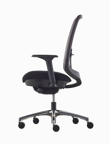 A Verus Chair with a black suspension back, black seat and frame viewed at the side.
