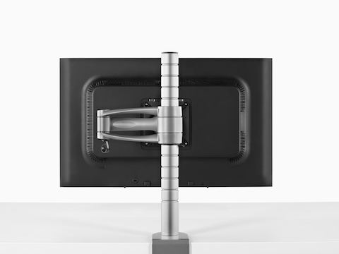 Rear view of a single monitor attached to a Wishbone Monitor Arm post.