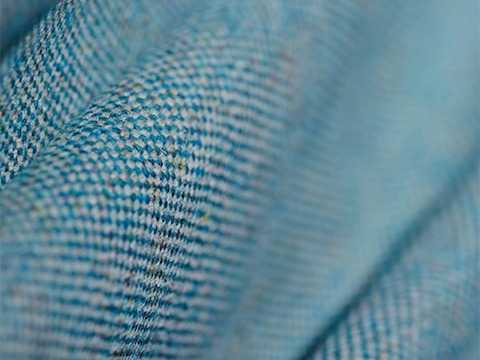 A Main Line Flax fabric swatch in blue.