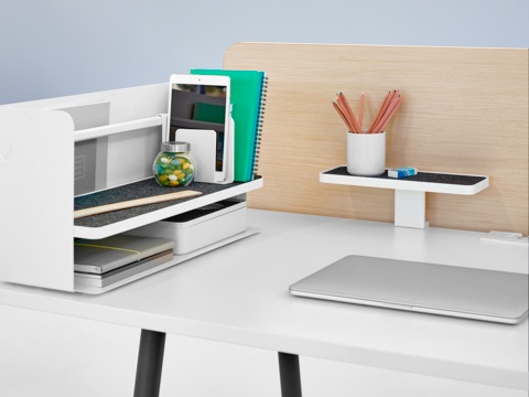Ubi Work Tools sit on top of a white work surface.
