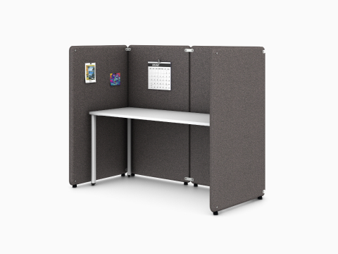 Four brown Bound Freestanding Screens in a booth configuration around a white OE1 Rectangular Table, viewed from an angle.