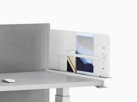 A Ubi Slim Screen with a magnetic document clip holding personal items.