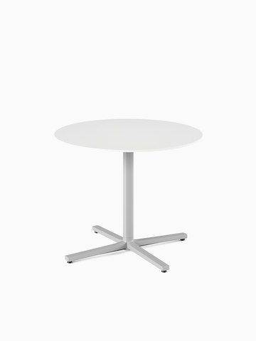 A standard height, round, white Everywhere Table with a grey column.