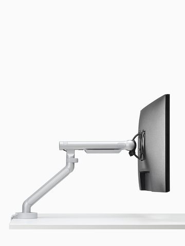 Flo Single monitor arm in silver viewed from the side.