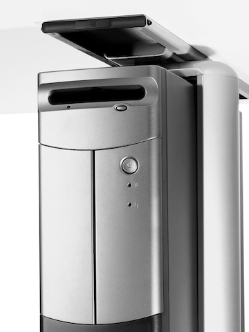 A CPU attached with an aluminum clamp to the underside of a work surface. Select to go to the Jaw CPU Holder product page.