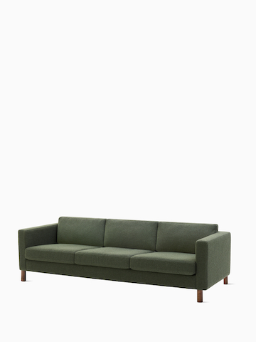Three-seater Lispenard Sofa, 431.8 mm in dark green textile and 152.4 mm walnut legs.