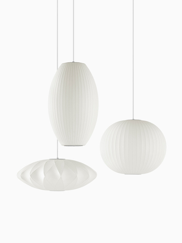 Three white Pendant lamps.