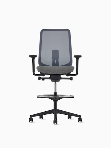 Front view of a black Verus Stool with upholstered back.