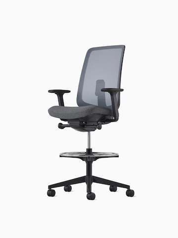 Angled view of a black Verus Stool with upholstered back. Click to go to the Verus Stool product page.