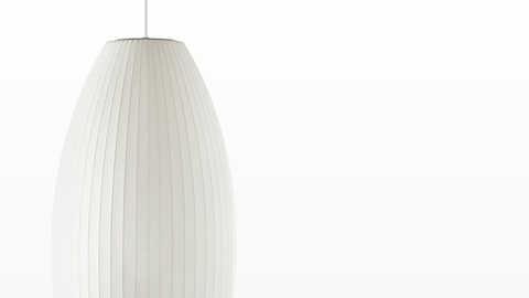 Close view of the shade on a medium Nelson Cigar Bubble Pendant white hanging lamp.