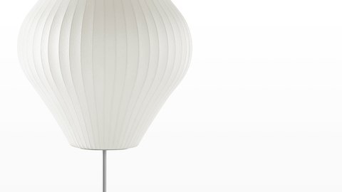 Close view of the white shade on a Nelson Pear Lotus Floor Lamp.